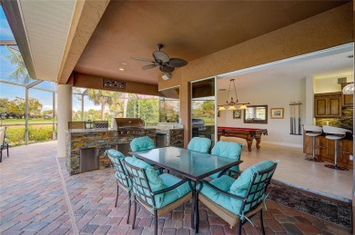 Luxury, comfort and views converge!  This captivating LAKEFRONT on Calusa Lakes Golf Club in Florida - for sale on GolfHomes.com, golf home, golf lot
