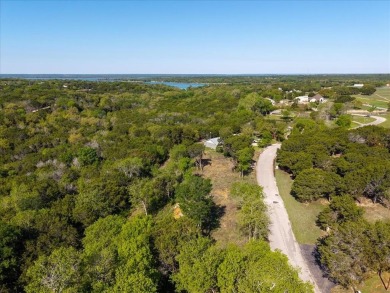Located on the desirable Country Club Road, this rare offering on Lake Whitney Country Club in Texas - for sale on GolfHomes.com, golf home, golf lot
