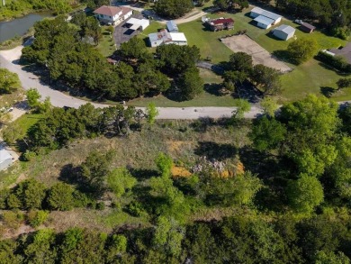 Located on the desirable Country Club Road, this rare offering on Lake Whitney Country Club in Texas - for sale on GolfHomes.com, golf home, golf lot
