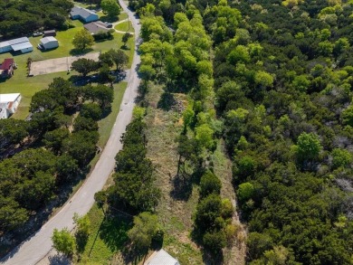 Located on the desirable Country Club Road, this rare offering on Lake Whitney Country Club in Texas - for sale on GolfHomes.com, golf home, golf lot