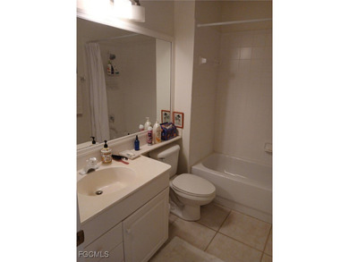 This charming condo located at 5877 Three Iron Drive in Naples on The Club At Strand in Florida - for sale on GolfHomes.com, golf home, golf lot