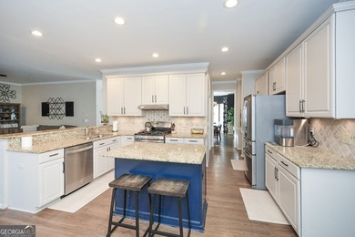 Imagine pulling into the driveway of a stunning traditional on Canongate At Eagle Watch Golf Club in Georgia - for sale on GolfHomes.com, golf home, golf lot