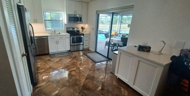 Located in a quiet cul-de-sac within a desirable golf course on Boca Greens Country Club in Florida - for sale on GolfHomes.com, golf home, golf lot