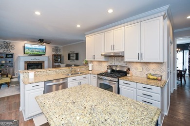 Imagine pulling into the driveway of a stunning traditional on Canongate At Eagle Watch Golf Club in Georgia - for sale on GolfHomes.com, golf home, golf lot