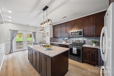 Welcome to this 5-bedroom, 3-bath home in the desirable Highland on Highland Creek Golf Club in North Carolina - for sale on GolfHomes.com, golf home, golf lot