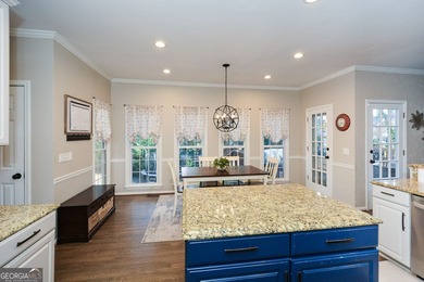 Imagine pulling into the driveway of a stunning traditional on Canongate At Eagle Watch Golf Club in Georgia - for sale on GolfHomes.com, golf home, golf lot