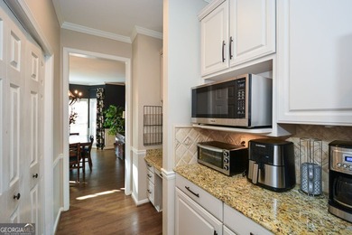 Imagine pulling into the driveway of a stunning traditional on Canongate At Eagle Watch Golf Club in Georgia - for sale on GolfHomes.com, golf home, golf lot