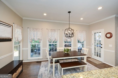 Imagine pulling into the driveway of a stunning traditional on Canongate At Eagle Watch Golf Club in Georgia - for sale on GolfHomes.com, golf home, golf lot