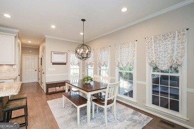 Imagine pulling into the driveway of a stunning traditional on Canongate At Eagle Watch Golf Club in Georgia - for sale on GolfHomes.com, golf home, golf lot