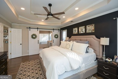 Imagine pulling into the driveway of a stunning traditional on Canongate At Eagle Watch Golf Club in Georgia - for sale on GolfHomes.com, golf home, golf lot