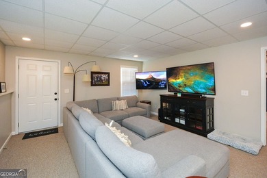 Imagine pulling into the driveway of a stunning traditional on Canongate At Eagle Watch Golf Club in Georgia - for sale on GolfHomes.com, golf home, golf lot