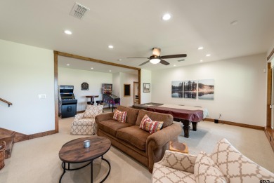 Welcome to 109 King Shore Blvd, a luxury waterfront retreat in on Cypress Creek Country Club in Texas - for sale on GolfHomes.com, golf home, golf lot