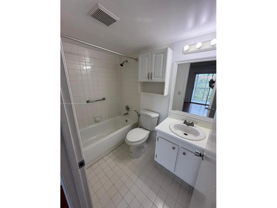 Step into this beautifully 1-bedroom, 1.5-bath residence on Flamingo Lakes Country Club in Florida - for sale on GolfHomes.com, golf home, golf lot