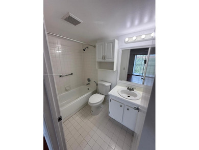 Step into this beautifully 1-bedroom, 1.5-bath residence on Flamingo Lakes Country Club in Florida - for sale on GolfHomes.com, golf home, golf lot