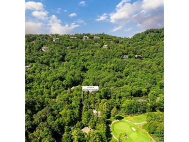 Discover the perfect setting for your mountain retreat on this on Highlands Country Club in North Carolina - for sale on GolfHomes.com, golf home, golf lot