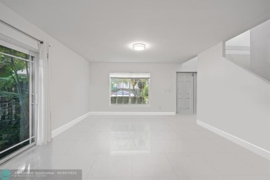 Nestled in the heart of Doral Park, this stunning 4-bedroom, 2 on Jim McLean Signature Course in Florida - for sale on GolfHomes.com, golf home, golf lot