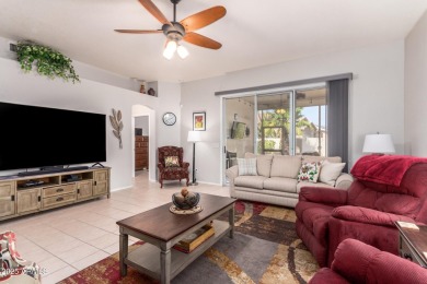 Fall in love with this spacious 3-bed, 2-bath gem featuring a on Coyote Lakes Golf Club in Arizona - for sale on GolfHomes.com, golf home, golf lot