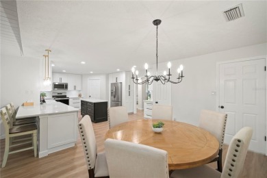 This beautifully maintained single-story home in Lake Padgett on Plantation Palms Golf Club in Florida - for sale on GolfHomes.com, golf home, golf lot