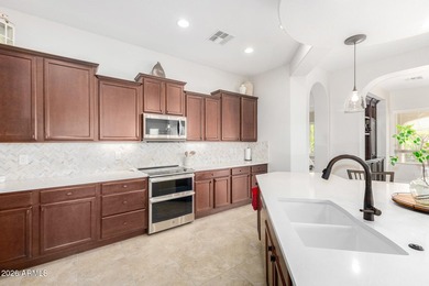 This beautifully maintained home features bright tile flooring on Trilogy Golf Club At Vistancia in Arizona - for sale on GolfHomes.com, golf home, golf lot