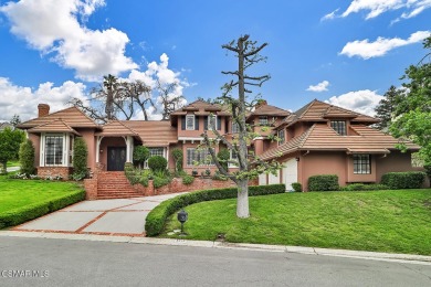Nestled on a serene, tree-lined street in the prestigious on North Ranch Country Club in California - for sale on GolfHomes.com, golf home, golf lot