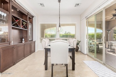 This beautifully maintained home features bright tile flooring on Trilogy Golf Club At Vistancia in Arizona - for sale on GolfHomes.com, golf home, golf lot