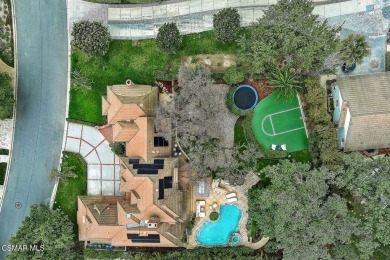 Nestled on a serene, tree-lined street in the prestigious on North Ranch Country Club in California - for sale on GolfHomes.com, golf home, golf lot