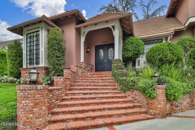Nestled on a serene, tree-lined street in the prestigious on North Ranch Country Club in California - for sale on GolfHomes.com, golf home, golf lot