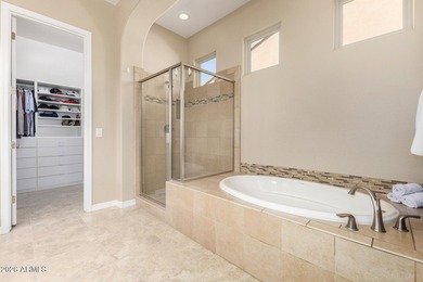 This beautifully maintained home features bright tile flooring on Trilogy Golf Club At Vistancia in Arizona - for sale on GolfHomes.com, golf home, golf lot