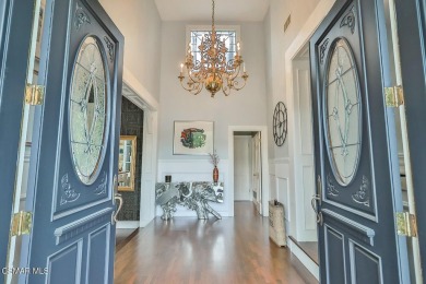 Nestled on a serene, tree-lined street in the prestigious on North Ranch Country Club in California - for sale on GolfHomes.com, golf home, golf lot
