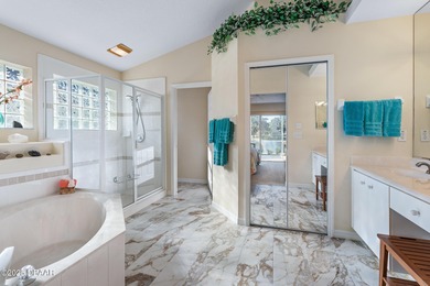Step into an abundance of natural sunlight in this well on Plantation Bay Golf and Country Club in Florida - for sale on GolfHomes.com, golf home, golf lot