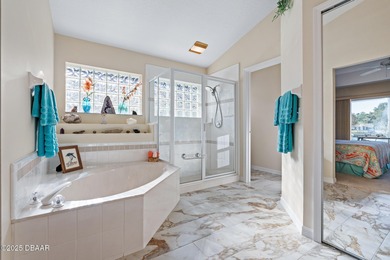 Step into an abundance of natural sunlight in this well on Plantation Bay Golf and Country Club in Florida - for sale on GolfHomes.com, golf home, golf lot