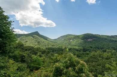 Perched high above Sapphire Valley, this stunning mountain on The Country Club of Sapphire Valley in North Carolina - for sale on GolfHomes.com, golf home, golf lot