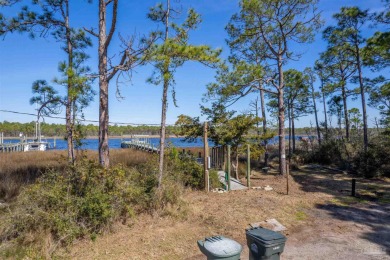 DEEP WATER ACCESS WATERFRONT LOT with DOCK and BOAT LIFT on on Perdido Bay Golf Club in Florida - for sale on GolfHomes.com, golf home, golf lot