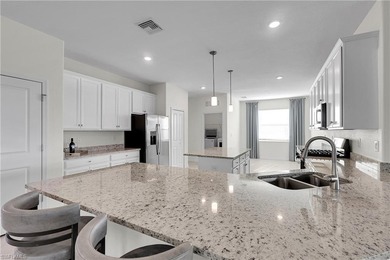 NEED A 3-CAR GARAGE? This contemporary lake view home has 4 on Babcock National Golf Course in Florida - for sale on GolfHomes.com, golf home, golf lot