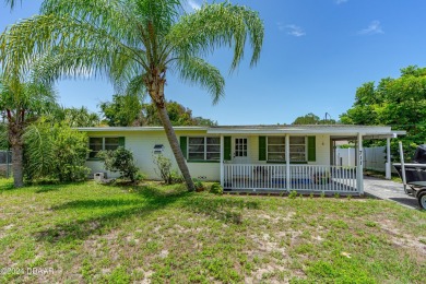 Living in paradise that is conveniently located to everything on New Smyrna Beach Golf Course in Florida - for sale on GolfHomes.com, golf home, golf lot