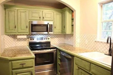Lake house getaway or retirement home of your dreams! 4 bed, 2.5 on Nocona Hills Golf Course in Texas - for sale on GolfHomes.com, golf home, golf lot