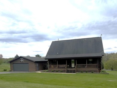 Charming Log Home on Corner Lot - Perfect Golf Course Retreat! on Lake Carroll Golf Course in Illinois - for sale on GolfHomes.com, golf home, golf lot