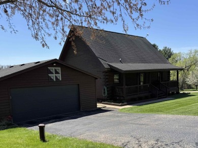 Charming Log Home on Corner Lot - Perfect Golf Course Retreat! on Lake Carroll Golf Course in Illinois - for sale on GolfHomes.com, golf home, golf lot