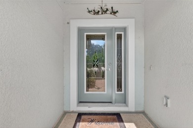 This 2 bed room 2 bath home with a den/study . Two solar lights on Arlington Ridge Golf Club in Florida - for sale on GolfHomes.com, golf home, golf lot