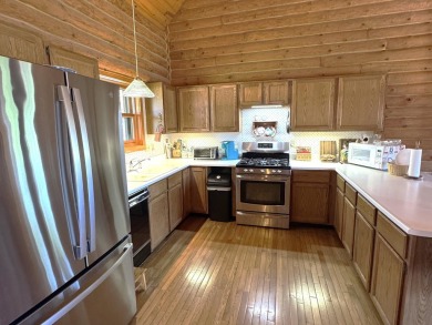 Charming Log Home on Corner Lot - Perfect Golf Course Retreat! on Lake Carroll Golf Course in Illinois - for sale on GolfHomes.com, golf home, golf lot