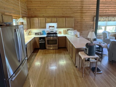 Charming Log Home on Corner Lot - Perfect Golf Course Retreat! on Lake Carroll Golf Course in Illinois - for sale on GolfHomes.com, golf home, golf lot