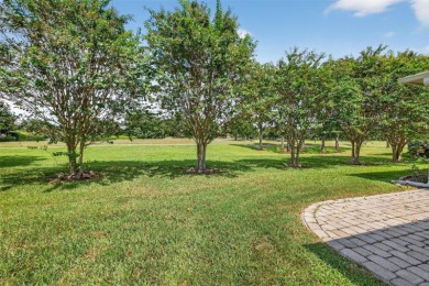 This 2 bed room 2 bath home with a den/study . Two solar lights on Arlington Ridge Golf Club in Florida - for sale on GolfHomes.com, golf home, golf lot