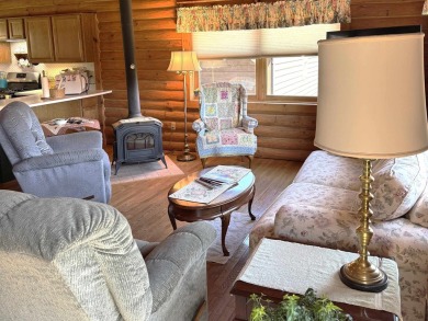Charming Log Home on Corner Lot - Perfect Golf Course Retreat! on Lake Carroll Golf Course in Illinois - for sale on GolfHomes.com, golf home, golf lot