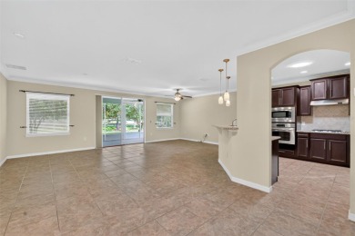 This 2 bed room 2 bath home with a den/study . Two solar lights on Arlington Ridge Golf Club in Florida - for sale on GolfHomes.com, golf home, golf lot