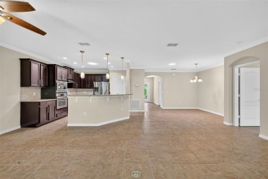 This 2 bed room 2 bath home with a den/study . Two solar lights on Arlington Ridge Golf Club in Florida - for sale on GolfHomes.com, golf home, golf lot