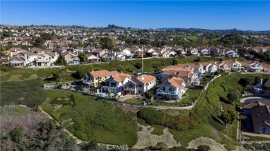 Enjoy panoramic views from this extensively remodeled home in on Monarch Beach Golf Links in California - for sale on GolfHomes.com, golf home, golf lot