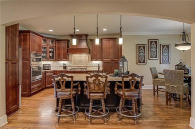 Elegant, classic, brick and stone transitional home in Salem on Salem Glen Country Club in North Carolina - for sale on GolfHomes.com, golf home, golf lot