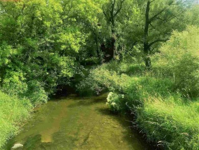 Build your dream home on the final available lot in The Oaks - on The Oaks Golf Course in Wisconsin - for sale on GolfHomes.com, golf home, golf lot