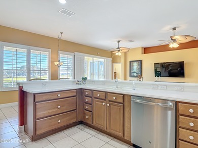 Listed BELOW APPRAISED VALUE, this 3-bedroom 2-bathroom home is on LPGA International Golf Course in Florida - for sale on GolfHomes.com, golf home, golf lot