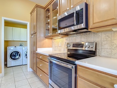 Listed BELOW APPRAISED VALUE, this 3-bedroom 2-bathroom home is on LPGA International Golf Course in Florida - for sale on GolfHomes.com, golf home, golf lot